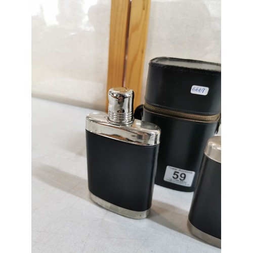 59 - Cased set of 2 x hip flasks, in original case, one hip flask has original stopper, both in good orde... 