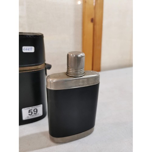 59 - Cased set of 2 x hip flasks, in original case, one hip flask has original stopper, both in good orde... 