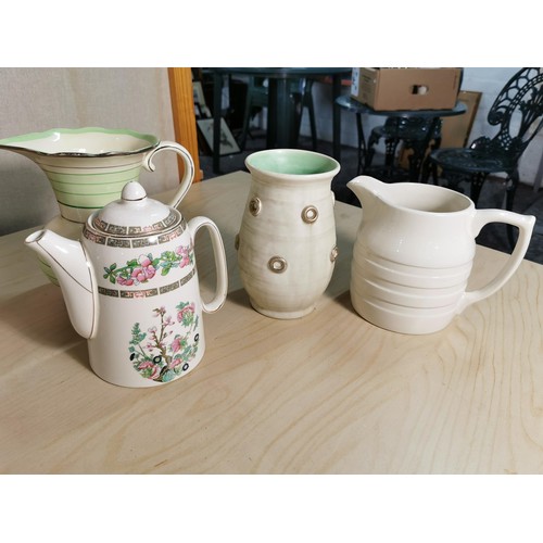 69 - Large quantity of various pottery/ china teapots and jugs along with a lidded Yardley lidded ginger ... 