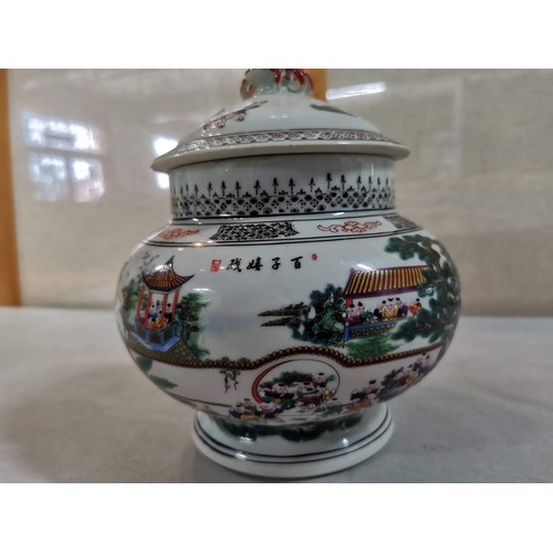 64 - Large ceramic lidded Chinese pot with poem to the side and hand painted populated scene to the other... 