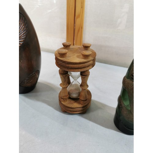 65 - Tall wooden carved shell decoration vase along with a good quality wooden egg timer in good order al... 