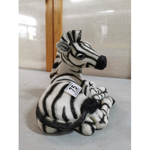 75 - Good quality resin recumbent Zebra figure by The Leonardo collection 2002, in good overall condition... 