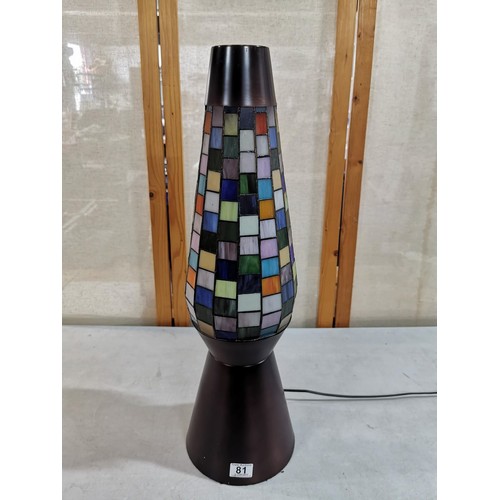 81 - Large multi coloured stained glass Tiffany style rocket lamp standing on a copper effect base in goo... 