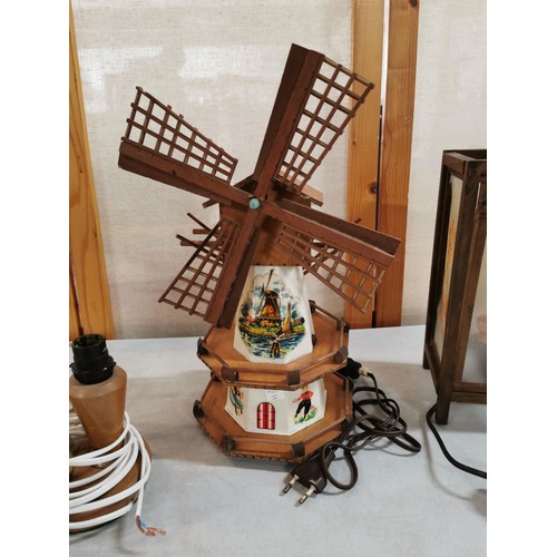 82 - Collection of table lamps inc a windmill formed light depicting dutch scenes, wooden based lamp with... 