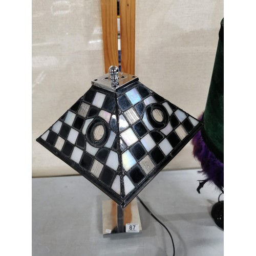 87 - Good quality Tiffany style table lamp with chrome base and black and white stained glass shade along... 