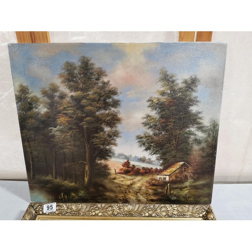 95 - Gilt framed print of a children scene along with a canvas oil picture of a country scene largest mea... 