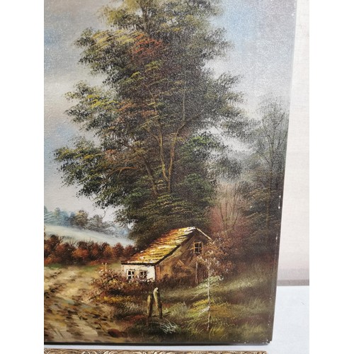 95 - Gilt framed print of a children scene along with a canvas oil picture of a country scene largest mea... 