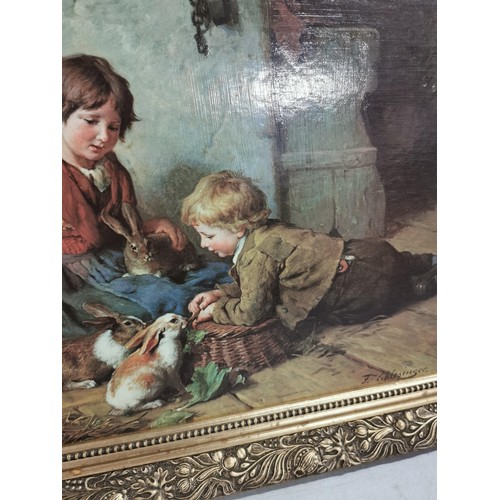 95 - Gilt framed print of a children scene along with a canvas oil picture of a country scene largest mea... 