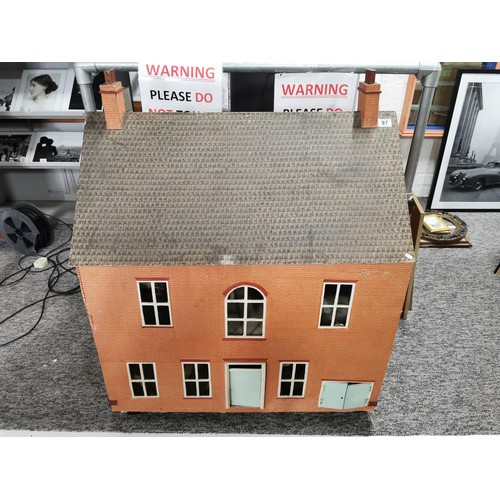 97 - Very large impressive dolls house perfect for restoration, in the design of a Victorian red brick ho... 