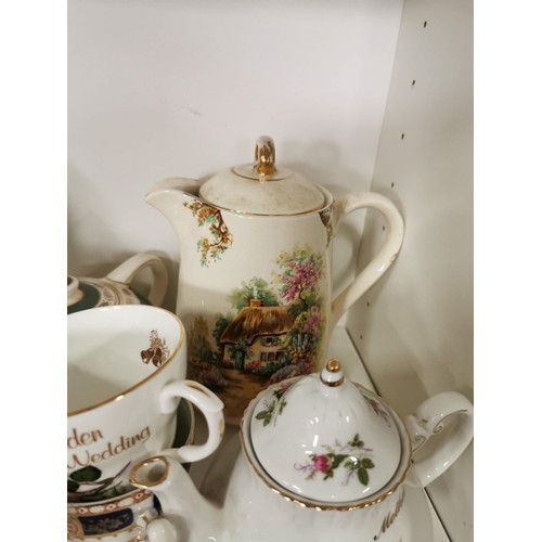 106 - Shelf full of collectable china mostly relating to wedding anniversary's inc Golden Wedding cups and... 