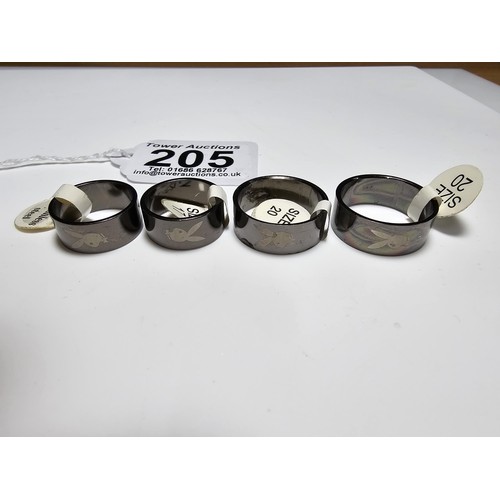 205 - Collection of 4x brand new official Playboy rings with the Playboy logo around the band of the rings... 