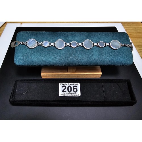 206 - A good quality 925 silver panel bracelet inset with 7 large round blue lace agate hardstones, presen... 