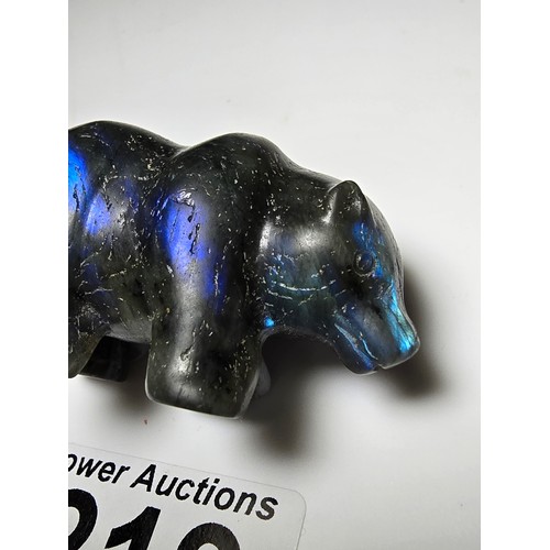 219 - A pretty labradorite hardstone carved polar bear figure presenting excellent natural deep blue flash... 