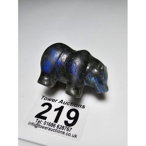 219 - A pretty labradorite hardstone carved polar bear figure presenting excellent natural deep blue flash... 