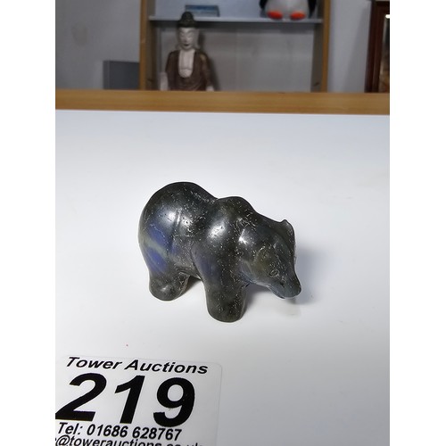 219 - A pretty labradorite hardstone carved polar bear figure presenting excellent natural deep blue flash... 