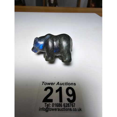 219 - A pretty labradorite hardstone carved polar bear figure presenting excellent natural deep blue flash... 