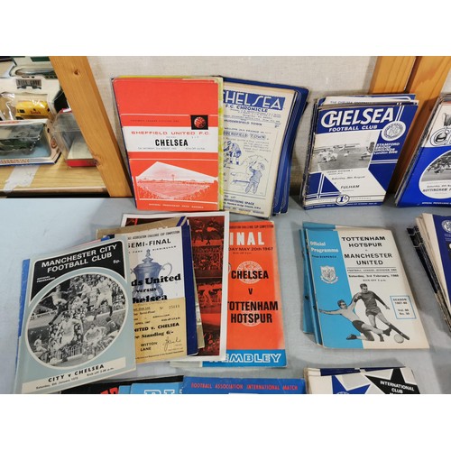 134 - Large collection of vintage of Chelsea football programmes dating from 1946-1947 season along with o... 