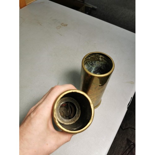 135 - 2x brass shell cases dated 1977 and 2x smaller shells dated 1918 marked Karlsruhe. All have been dis... 