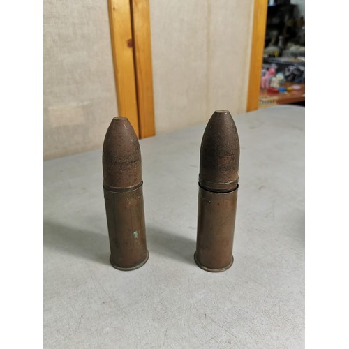 135 - 2x brass shell cases dated 1977 and 2x smaller shells dated 1918 marked Karlsruhe. All have been dis... 