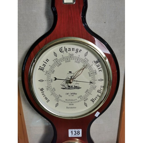 138 - A good quality modern banjo barometer, with mahogany effect, temperature gauge to the top hygrometer... 