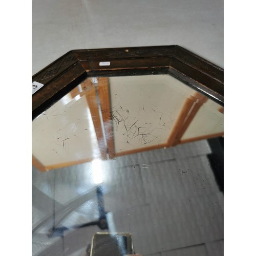 143 - Good quality large oak framed bevel edged mirror with carving to the edges, measures 82cm high 53cm ... 