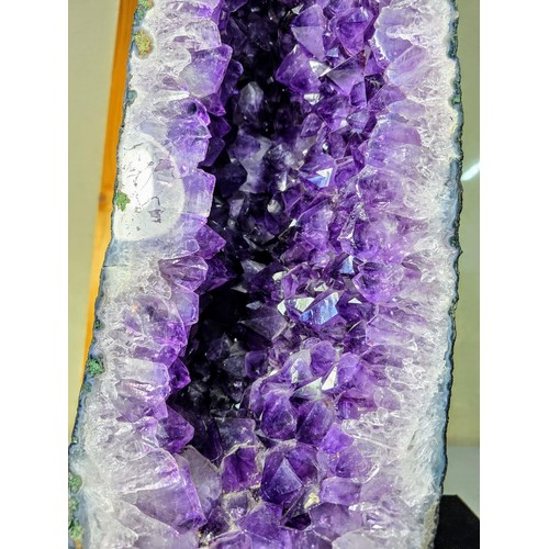 314 - A very large and impressive amethyst cathedral church geode in A grade quality standing at an impres... 