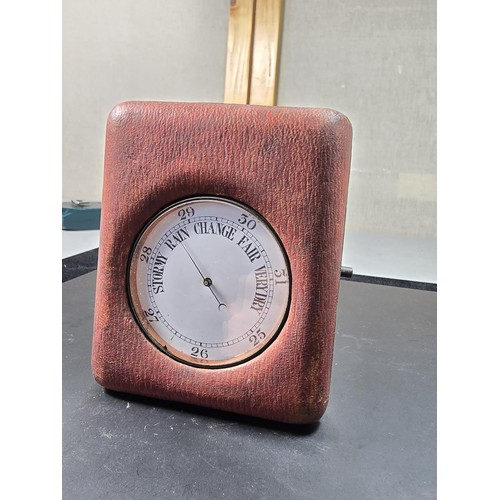 322 - A good quality antique pocket barometer complete with its original leather fitted travel case with a... 