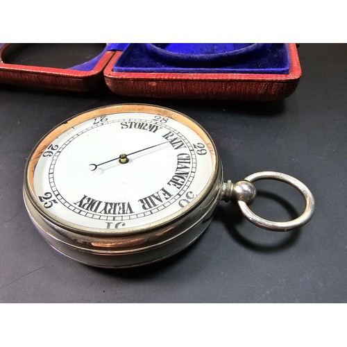 322 - A good quality antique pocket barometer complete with its original leather fitted travel case with a... 