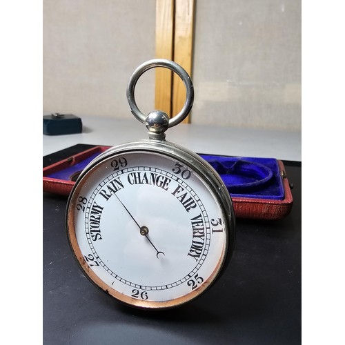 322 - A good quality antique pocket barometer complete with its original leather fitted travel case with a... 