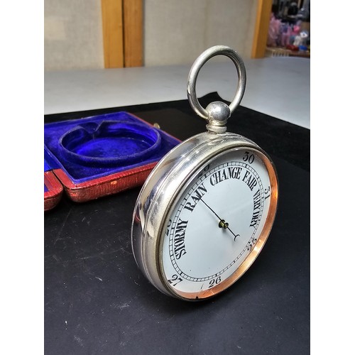 322 - A good quality antique pocket barometer complete with its original leather fitted travel case with a... 