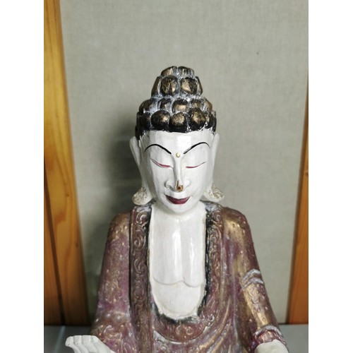 154 - Wooden Buddha figure on a plinth in good order measures 45cm high, 23cm wide and 17cm deep