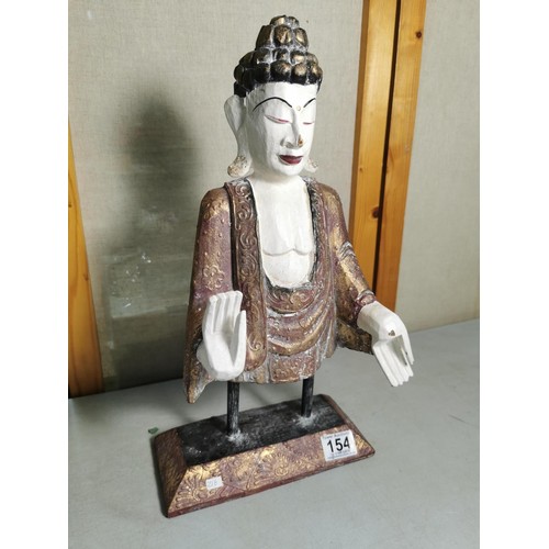 154 - Wooden Buddha figure on a plinth in good order measures 45cm high, 23cm wide and 17cm deep