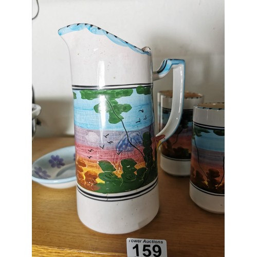 159 - A hand painted ceramic lemonade set with a forest scene to the sides along with 2x studio pottery pi... 