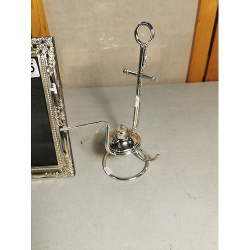 165 - Good quality anchor formed chromed brandy glass warmer complete with burner along with a silver plat... 