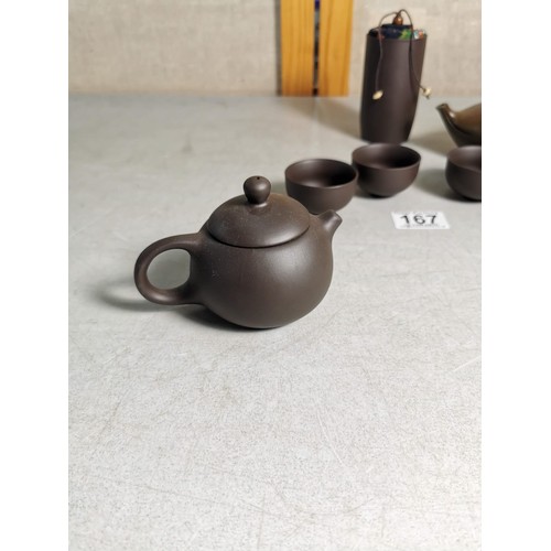 167 - A good quality Yixing clay teapot drinking set with 4x drinking bowls, along with a cicada lidded te... 