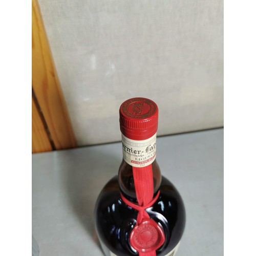 168 - New and sealed bottle of Grand Marnier 70cl along with a chrome hip flask with Celtic knot design, a... 