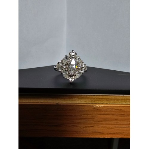 231 - A new and unused stunning 925 silver cluster ring featuring a large quantity of sparkly crystal cz s... 