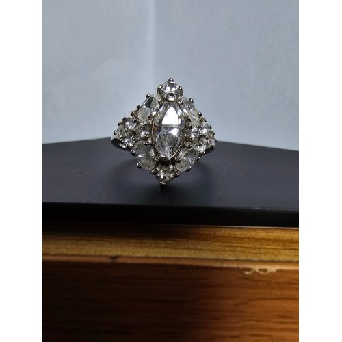 231 - A new and unused stunning 925 silver cluster ring featuring a large quantity of sparkly crystal cz s... 