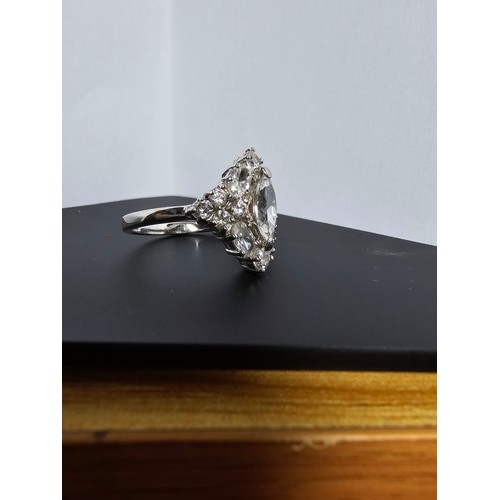 231 - A new and unused stunning 925 silver cluster ring featuring a large quantity of sparkly crystal cz s... 