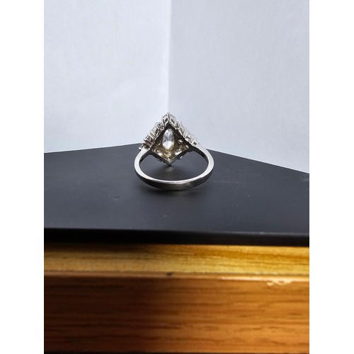 231 - A new and unused stunning 925 silver cluster ring featuring a large quantity of sparkly crystal cz s... 