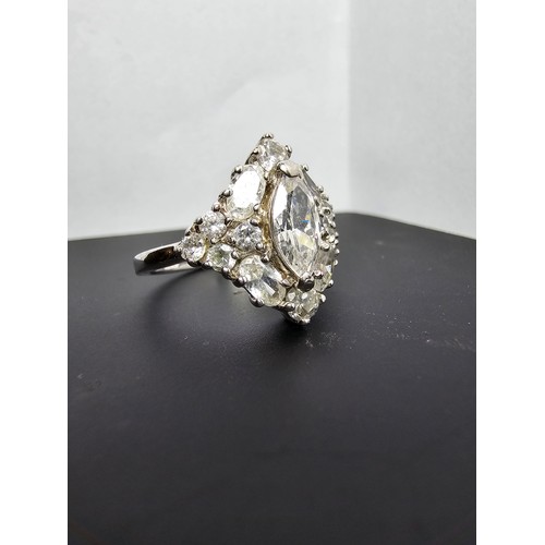 231 - A new and unused stunning 925 silver cluster ring featuring a large quantity of sparkly crystal cz s... 