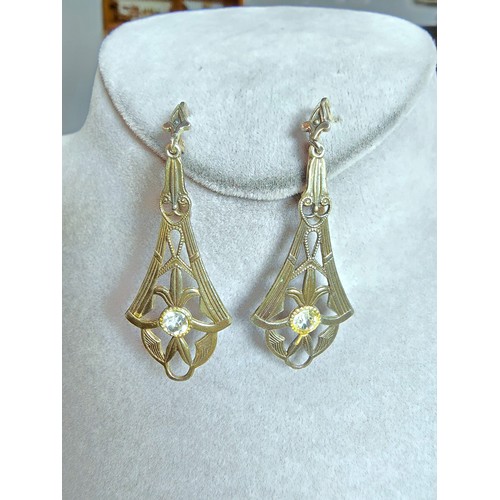 232 - A pair of pretty vintage 980 silver long drop clip on earnings for pierced ears. The earrings have a... 