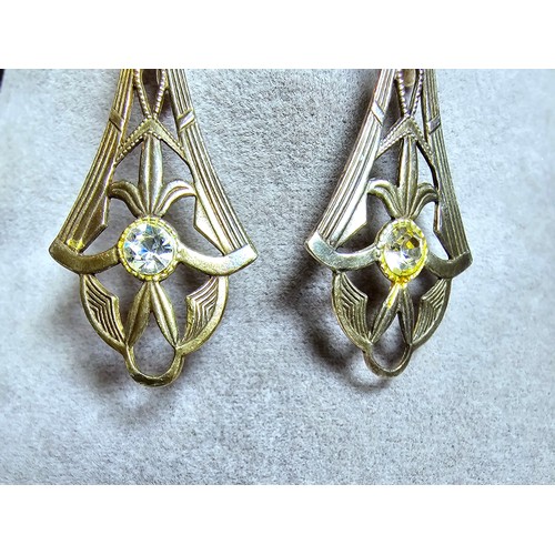 232 - A pair of pretty vintage 980 silver long drop clip on earnings for pierced ears. The earrings have a... 