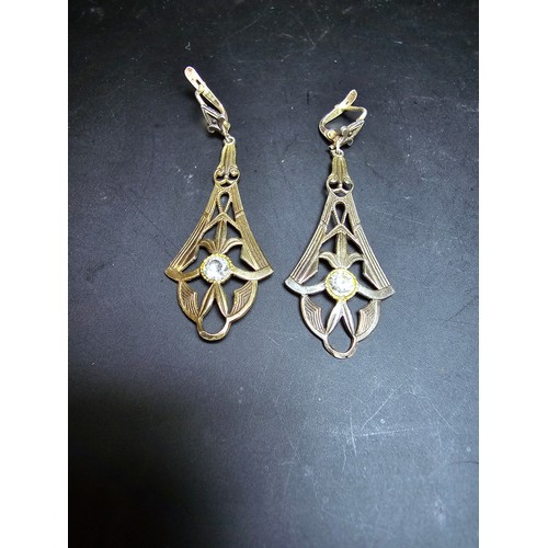 232 - A pair of pretty vintage 980 silver long drop clip on earnings for pierced ears. The earrings have a... 