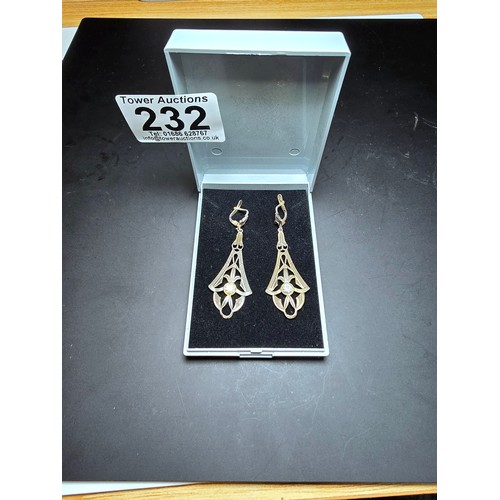 232 - A pair of pretty vintage 980 silver long drop clip on earnings for pierced ears. The earrings have a... 