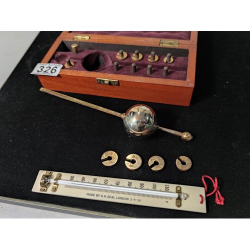 326 - A good antique cased hydrometer by G.H.Zeal ltd London, the set looks fully complete which includes ... 