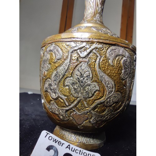 331 - A good quality antique Cairo ware inlaid brass vase, inlaid with real silver and copper featuring an... 