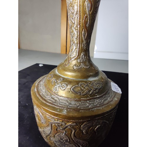 331 - A good quality antique Cairo ware inlaid brass vase, inlaid with real silver and copper featuring an... 