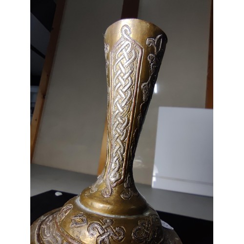 331 - A good quality antique Cairo ware inlaid brass vase, inlaid with real silver and copper featuring an... 