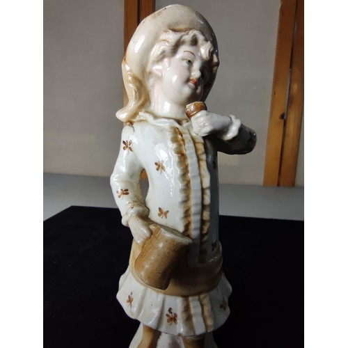 333 - 3 good antique figures which includes an antique German figure in the style of Gerbruder Heubach of ... 